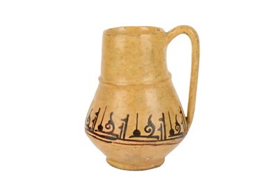 Lot 36 - A NISHAPUR GLAZED CERAMIC JUG