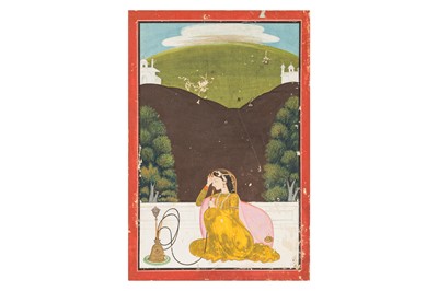 Lot 161 - A MINIATURE PAINTING DEPICTING A SEATED LADY SMOKING A HUQQA