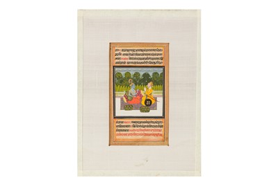 Lot 167 - A RAJPUT WARRIOR PRINCE WORSHIPPING LORD KRISHNA