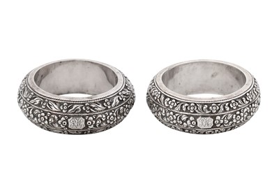 Lot 197 - A pair of late 19th / early 20th century Anglo – Indian unmarked silver napkin rings, Madras circa 1900