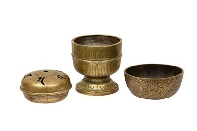 Lot 683 - A GROUP OF TIBETAN BRASS RITUAL VESSELS