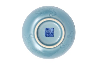 Lot 163 - A CHINESE MONOCHROME BLUE-GLAZED 'CLOUDS' WATER POT