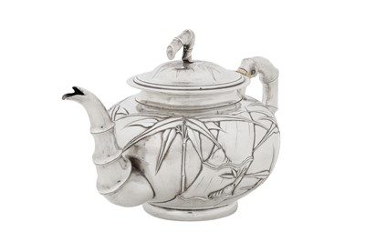 Lot 186 - An early 20th century Chinese export silver teapot, Shanghai circa 1920, marked Qi Chang, retailed by Sincere and Co of Shanghai, Hong Kong, Canton, and Nannin