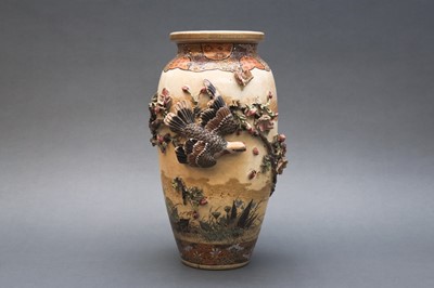 Lot 829 - A JAPANESE EARTHENWARE APPLIQUÉ-DECORATED VASE, IN THE STYLE OF MAKUZU KOZAN (1842-1916)