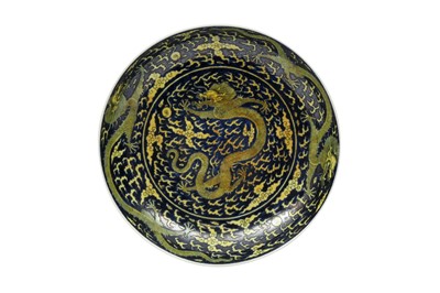 Lot 143 - A LARGE CHINESE BLUE AND YELLOW-ENAMELLED 'DRAGONS' DISH