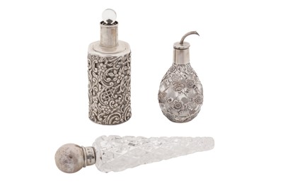 Lot 235 - A Victorian sterling silver mounted cut glass scent bottle, Birmingham 1892 by John Grinsell and Son