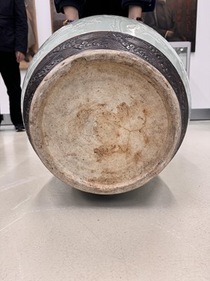 Lot 298 - A VERY LARGE CHINESE CELADON-GLAZED 'DRAGON' FISH BOWL