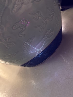 Lot 298 - A VERY LARGE CHINESE CELADON-GLAZED 'DRAGON' FISH BOWL