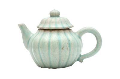 Lot 297 - A RARE CHINESE STONEWARE CELADON MELON-SHAPED TEAPOT AND COVER