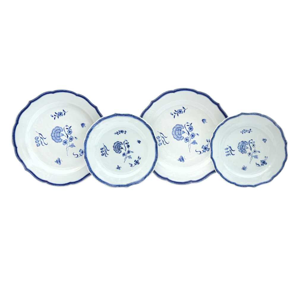 Lot 455 - Four Chinese export blue and white 'floral' dishes, Qing dynasty, Qianlong period