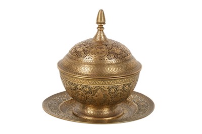 Lot 97 - A BRASS LIDDED BOWL WITH PLATE