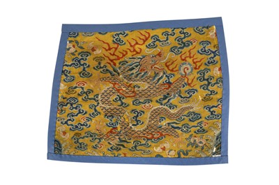 Lot 222 - A CHINESE KESI SILK YELLOW-GROUND 'DRAGON' PANEL