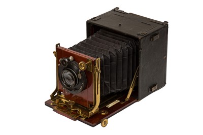 Lot 76 - A Thornton Pickard Quarter Plate Folding Ruby Mahogany & Brass Camera Outfit