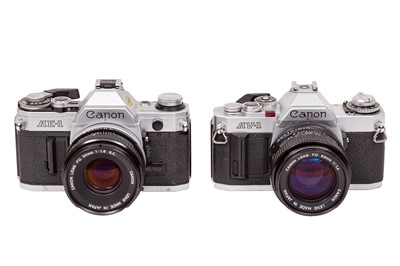 Lot 126 - A Pair of Canon SLR Cameras