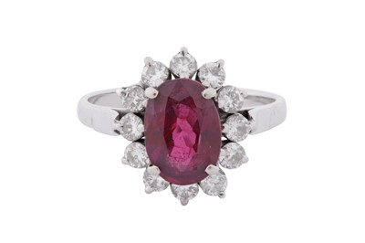 Lot 170 - A RUBY AND DIAMOND CLUSTER RING