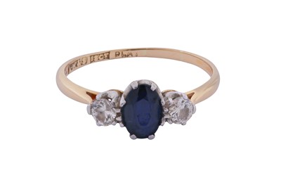 Lot 208 - A SAPPHIRE AND DIAMOND THREE-STONE RING