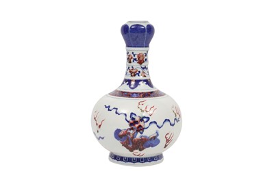 Lot 297 - A CHINESE BLUE AND WHITE AND COPPER-RED VASE