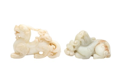 Lot 546 - TWO CHINESE ARCHAISTIC ‘MYTHICAL BEASTS’ JADE CARVINGS