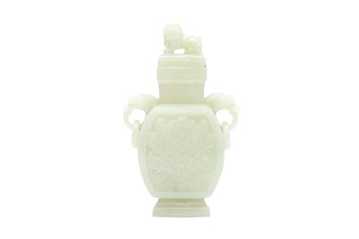 Lot 547 - A CHINESE ARCHAISTIC JADE VASE WITH HANDLES AND COVER