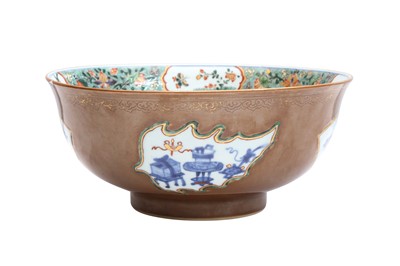 Lot 258 - A CHINESE EXPORT CAFÉ-AU-LAIT GROUND FAMILLE-VERTE 'LOTUS POND' BOWL