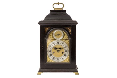 Lot 444 - A GEORGE III EBONISED BRACKET CLOCK