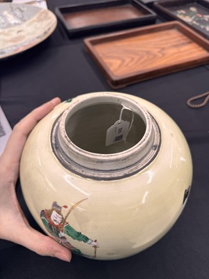 Lot 142 - A CHINESE FAMILLE-VERTE YELLOW-GROUND 'WARRIORS' JAR