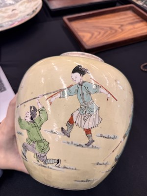 Lot 142 - A CHINESE FAMILLE-VERTE YELLOW-GROUND 'WARRIORS' JAR