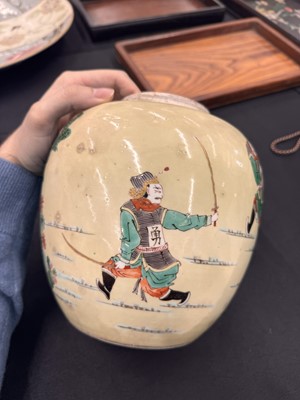 Lot 142 - A CHINESE FAMILLE-VERTE YELLOW-GROUND 'WARRIORS' JAR