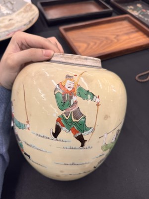 Lot 142 - A CHINESE FAMILLE-VERTE YELLOW-GROUND 'WARRIORS' JAR