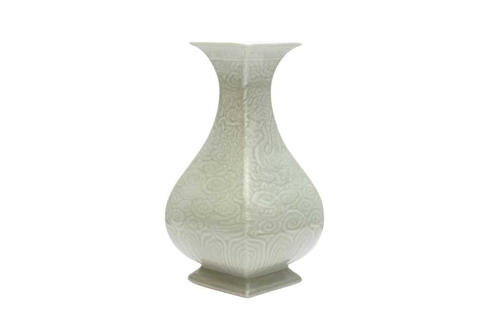 Lot 300 - A CHINESE CELADON-GLAZED 'DRAGON' VASE