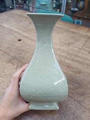 Lot 300 - A CHINESE CELADON-GLAZED 'DRAGON' VASE