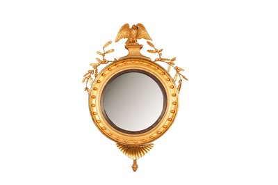 Lot 227 - A REGENCY GILTWOOD CONVEX MIRROR