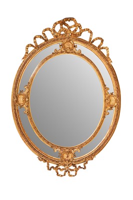 Lot 520 - A LOUIS XVI GILT GESSO WALL MIRROR, 19TH CENTURY