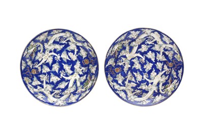 Lot 148 - A PAIR OF CHINESE BLUE-GROUND 'DRAGON' DISHES