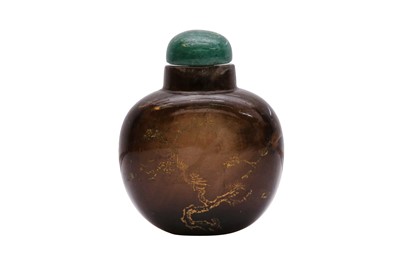 Lot 327 - A CHINESE INCISED AND GILT-PAINTED HARDSTONE SNUFF BOTTLE