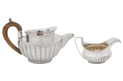 Lot 425 - A George III sterling silver teapot and milk jug, London 1803 by Peter, Ann, and William Bateman