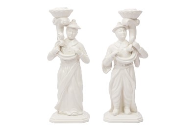 Lot 481 - A PAIR OF CONTEMPORARY BLANC DE CHINE FIGURAL CANDLESTICKS BY D&P, ITALY