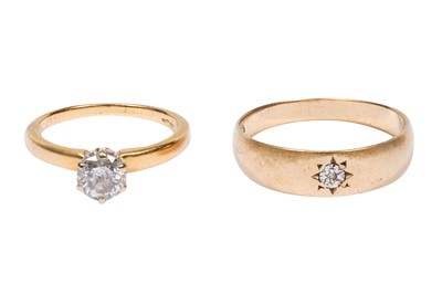 Lot 21 - TWO SINGLE-STONE DIAMOND RINGS