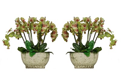 Lot 305 - A PAIR OF ARTIFICIAL GREEN SILK ORCHID ARRANGEMENT IN DECORATIVE CERAMIC PLANTERS