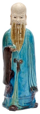 Lot 382 - A CHINESE GLAZED BISCUIT FIGURE OF SHOU LAO