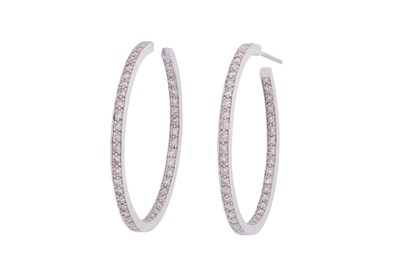 Lot 118 - A PAIR OF DIAMOND HOOP EARRINGS