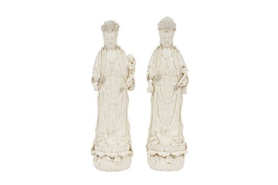 Lot 300 - A PAIR OF CHINESE BLANC-DE-CHINE FIGURES OF GUANYIN