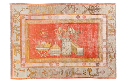 Lot 281 - AN ANTIQUE KHOTAN RUG, TURKESTAN