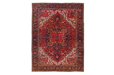 Lot 102 - AN ANTIQUE HERIZ CARPET, NORTH-WEST PERSIA