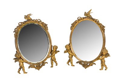 Lot 314 - A PAIR OF ORMOLU TABLE MIRRORS WITH CHERUBS, LATE 19TH CENTURY