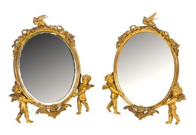 Lot 523 - A PAIR OF ORMOLU TABLE MIRRORS WITH CHERUBS, LATE 19TH CENTURY