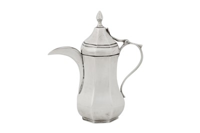 Lot 245 - A rare early 20th century Iraqi silver dallah coffee pot, Baghdad circa 1930 by Shuwa’ Jangana and Bros