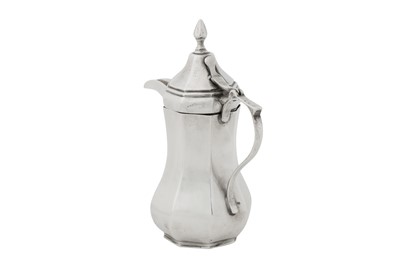 Lot 245 - A rare early 20th century Iraqi silver dallah coffee pot, Baghdad circa 1930 by Shuwa’ Jangana and Bros