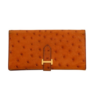 Lot 127 - λ Hermes Gold Ostritch Bi-Fold Wallet