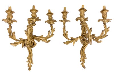 Lot 337 - A PAIR OF ROCOCO STYLE GILT BRASS THREE-BRANCH WALL SCONCES, LATE 19TH/EARLY 20TH CENTURY